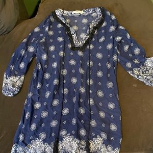 Cute blue tunic top with tassels and button sleeve